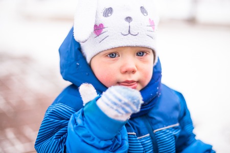 happy kid enjoy snow and winter on holidaysの写真素材