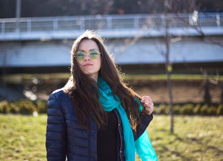 Portrait of a woman in downtown city outdoorの写真素材