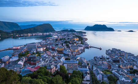 Night view of Alesund. Beautiful lights and reflections in sea. Norwayの写真素材