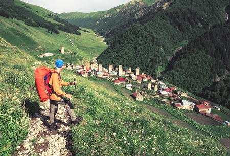Hiking in beautiful mountains. Group of hikers enjoy the weatherの写真素材