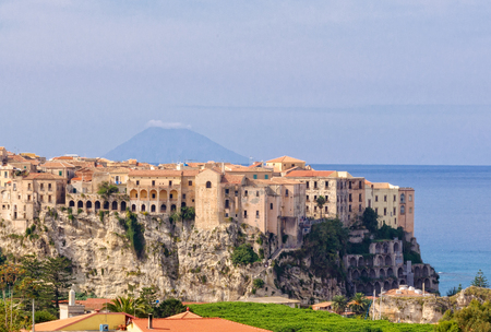 Tropea, a famous bathing place  situated on a reef in the gulf of St. Euphemia with the Aeolian Island Lipari in the background - Calabria, Italyのeditorial素材