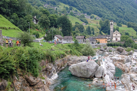 Tourists among smooth polished rocks and boulders in the Verzasca River (Fluss) - Lavertezzo, Val Verzasca, Switzerland, 17 July 2008のeditorial素材