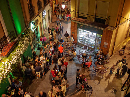 People of all ages enjoy a party on the Torres de Omana Square on a mild autumn evening - Leon, Castile and Leon, Spain, 20 September 2014のeditorial素材