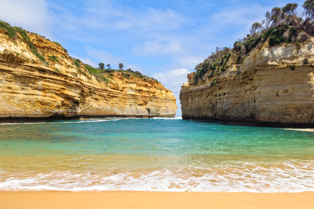Small beach at the bottom of the Loch Ard Gorge - Port Campbell, Victoria, Australiaの写真素材