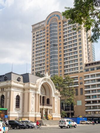 Saigon Opera House in the shadow of the Caravelle Hotel - Ho Chi Minh City, Vietnamのeditorial素材