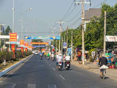 Mornig traffic on the main road - Long Xuyen, Vietnamのeditorial素材