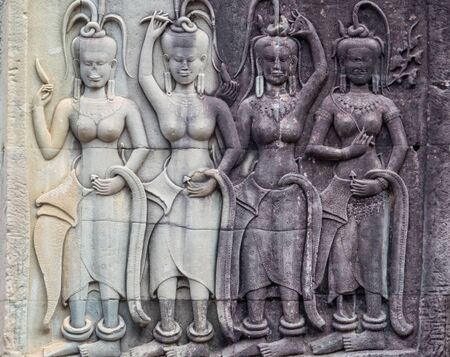 Bas-relief of female spirits (apsaras) at Angkor Wat - Siem reap, cambodia