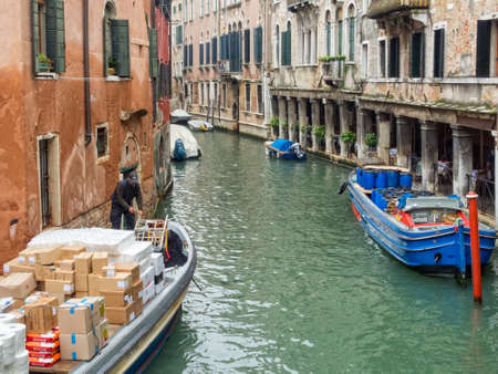 Boats on the Rio dei Santi Apostoli in the morning - Venice, Veneto, Italyのeditorial素材