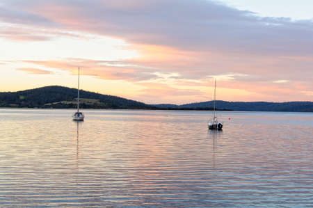 Sailing boats at anchor in Georges Bay - St Helens, Tasmania, Australiaのeditorial素材