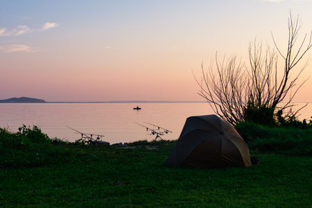 Fishing from the shore and from boats alike is very popular at the Lake Balaton - Revfulop, Hungaryの写真素材