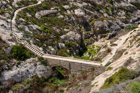 This little pedestrian stone bridge in the Kantra Valley is part of the Heritage Trail - Xlendi, Maltaの写真素材