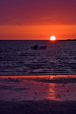 sunset near a mountain in nosy be madagascarの写真素材
