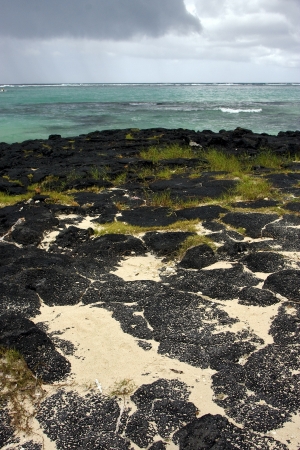 beach rock and stone in belle mare mauritiusの写真素材