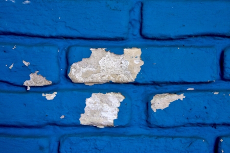 colored and broken blue wall   in colonia del sacramento uruguayの写真素材