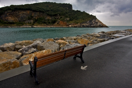 water coastline bench and autumn in porto venere  italyの写真素材