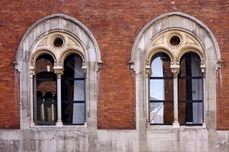 old castle brick   brown and window reflex in piazza dei mercanti milanの写真素材