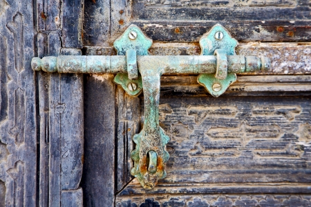 door abstract  spain canarias brass brown knocker in a green closed wood    lanzarote の写真素材