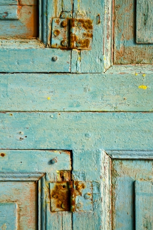 piece of colorated green wood as a window door in lanzarote spainの写真素材