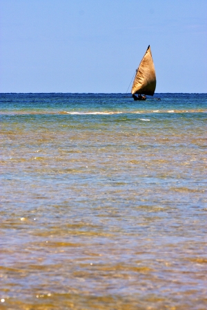 in the  blue lagoon relax and boat in madagascar coastline nosy iranjaの写真素材