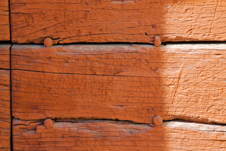 caidate   varese abstract  rusty brass brown knocker in a  door  closed wood lombardy italyの写真素材