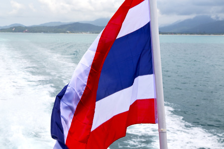 asia myanmar kho samui bay isle waving flag    in thailand and south china seaの写真素材