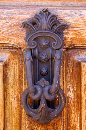 knocker in door closed  la boca  buenos aires argentinaの写真素材