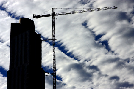 skyscraper clouds and crane in  buenos aires argentinaの写真素材