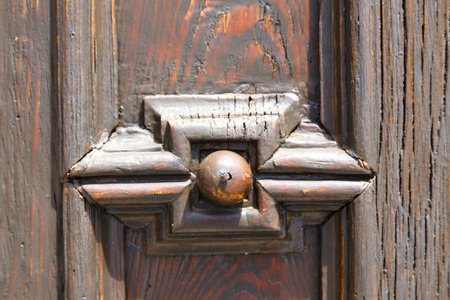 abstract  house door    in italy   lombardy   column  the milano old        closed nail rustyのeditorial素材