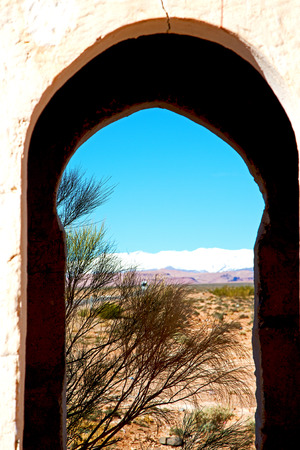 gate  in todra gorge morocco africa and  villageの写真素材