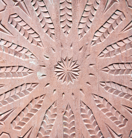 stripped paint in the blue  wood door and rusty      nailの写真素材