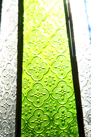 colorated glass and sun in morocco africa window and lightの写真素材