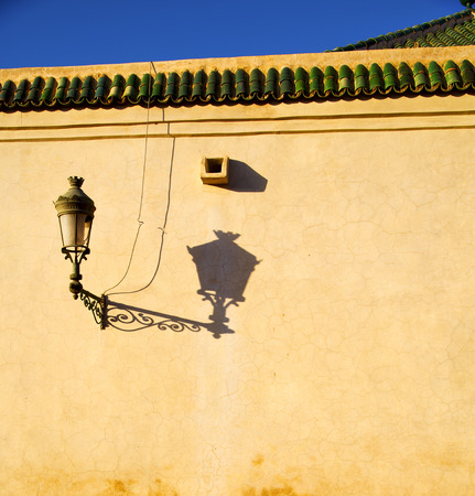 street lamp old construction in africa morocco and  leather near the towerの写真素材