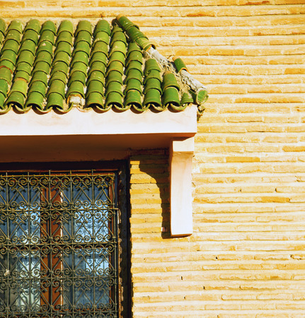window in morocco africa and old construction wal brick historicalの写真素材