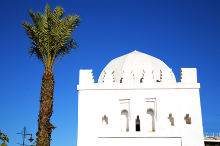 mosque muslim the history  symbol  in morocco  africa  minaret religion and  blue    skyの写真素材