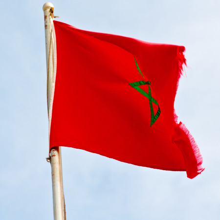 waving flag in the blue sky tunisia  colour and waveの写真素材