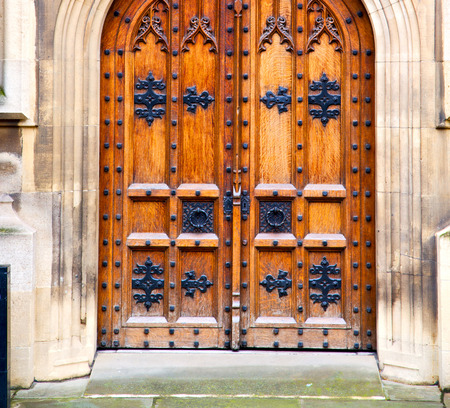 parliament in london old church door and marble antique  wallの写真素材