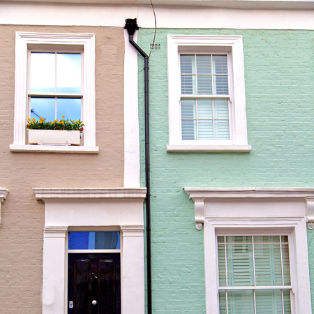 notting hill in london england old suburban and antique blue  wall doorの写真素材