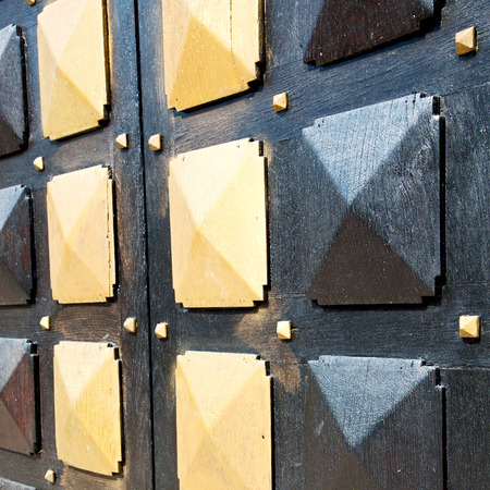 door in italy old ancian wood and traditional            texture nailの写真素材