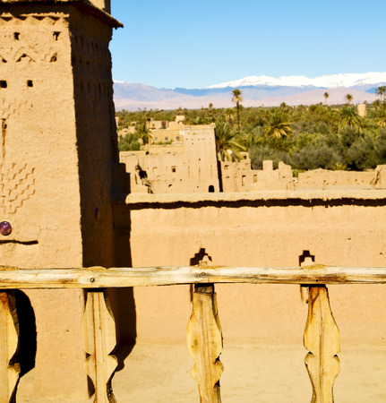 brown old  construction in  africa morocco and  clouds  near the towerの写真素材