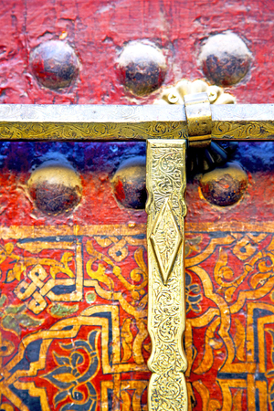 metal grey   morocco in    africa the old wood  facade home and rusty safe padlockの写真素材