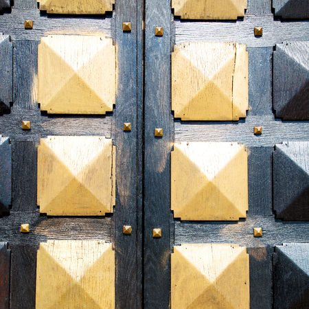 door in italy old ancian wood and traditional            texture nailの写真素材