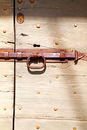 europe old in  italy  antique close brown door and rusty lock  closeupの写真素材