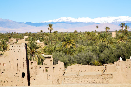 brown old  construction in  africa morocco and  clouds  near the towerのeditorial素材