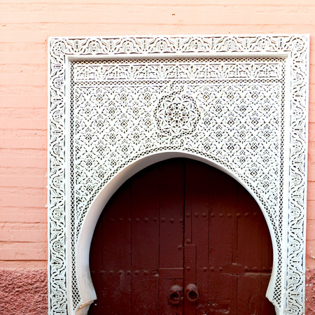 olddoor in morocco  africa ancien and wall ornate brownの写真素材