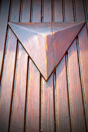 abstract texture of a brown antique wooden   old door in italy   europe