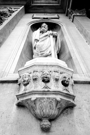 marble in old historical construction italy europe milan and statueの写真素材