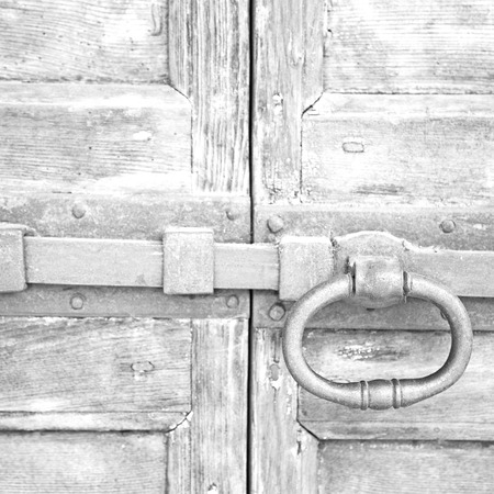 europe old in  italy  antique close brown door and rusty lock  closeupの写真素材