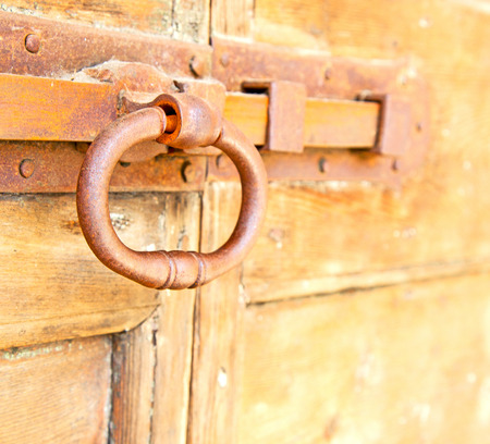 europe old in  italy  antique close brown door and rusty lock  closeup