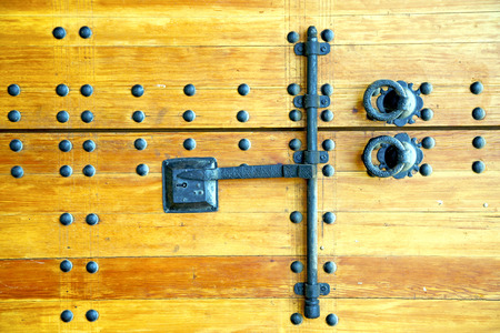 brown    morocco in    africa the old wood  facade home and rusty safe padlockの写真素材