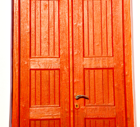 door      in antique village santorini greece europe   and white wallの写真素材